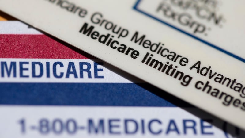 FILE - A Medicare Advantage PPO card rests on top of a Medicare card in Portland, Ore., June...