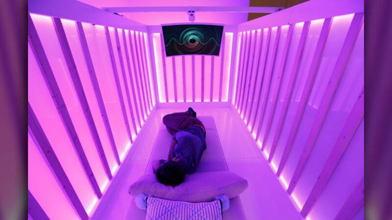 An attendee tests the Miku baby sleep and breathing monitor at the Miku booth at CES...