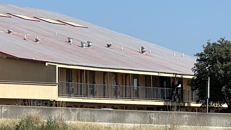 Wanted man barricaded in Lubbock motel room shot, maced and arrested